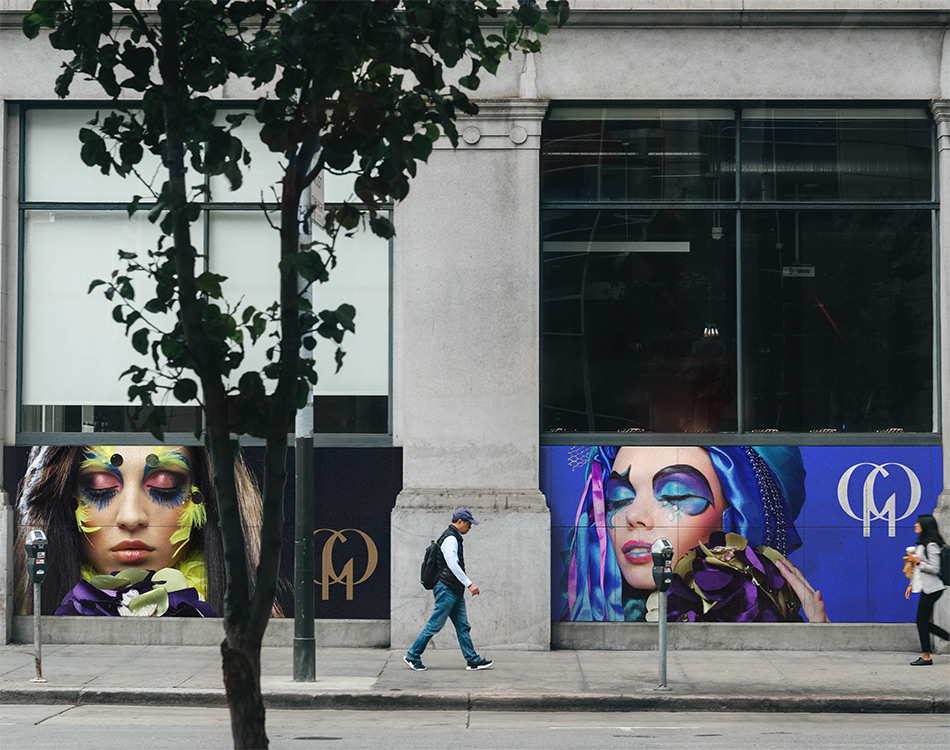 Grand Palais branded window promotions on a street in Vienna