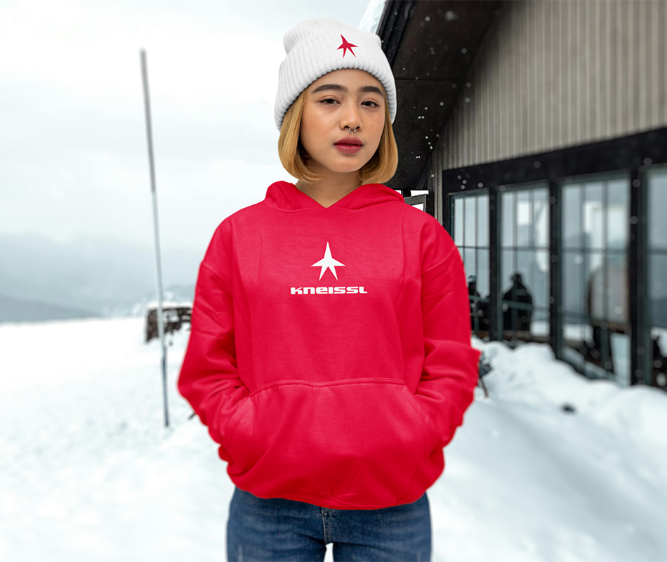 Kneissl apparel image of red hoody and white beanie