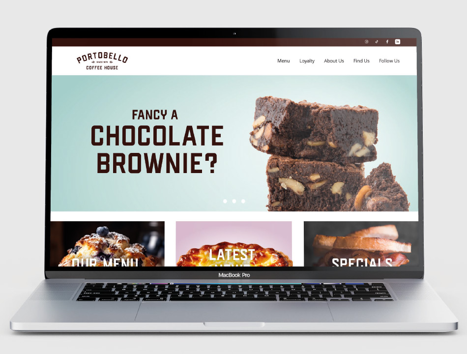 Portobello Coffee House website design home page on a laptop screen